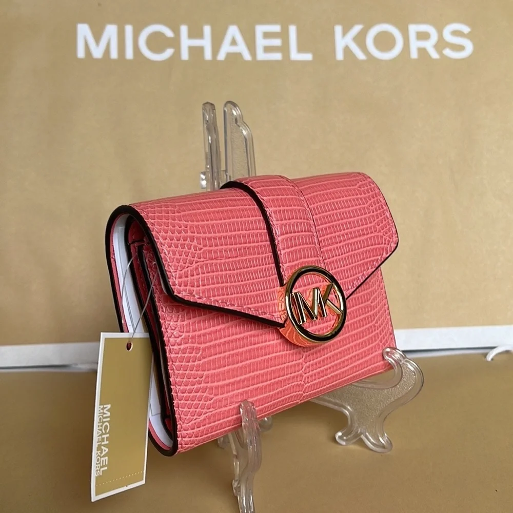 MICHAEL KORS CARMEN MEDIUM FLAP LOGO BIFOLD WALLET GRAPEFRUIT